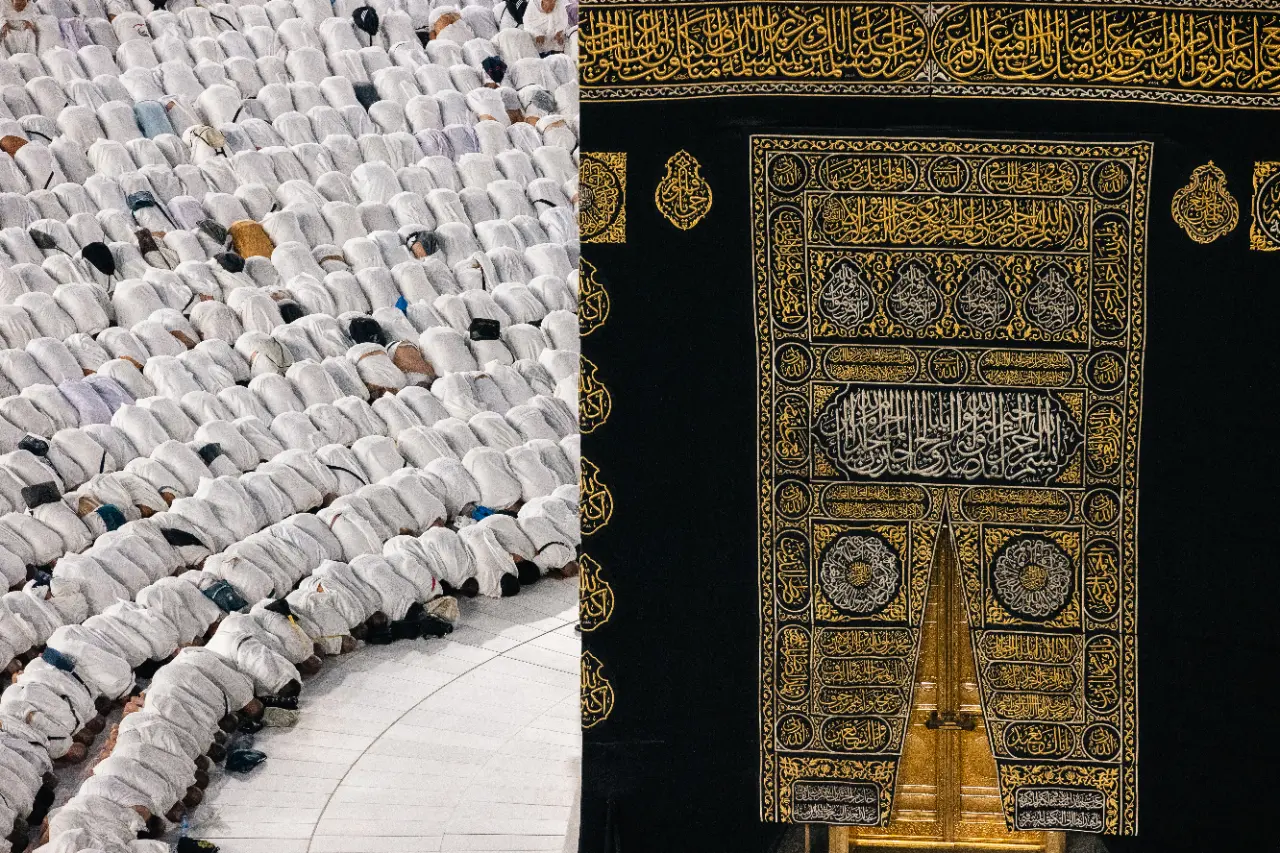 Pilgrims praying beside the Kaaba in Makkah